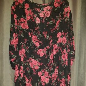 Long red and black floral shirt